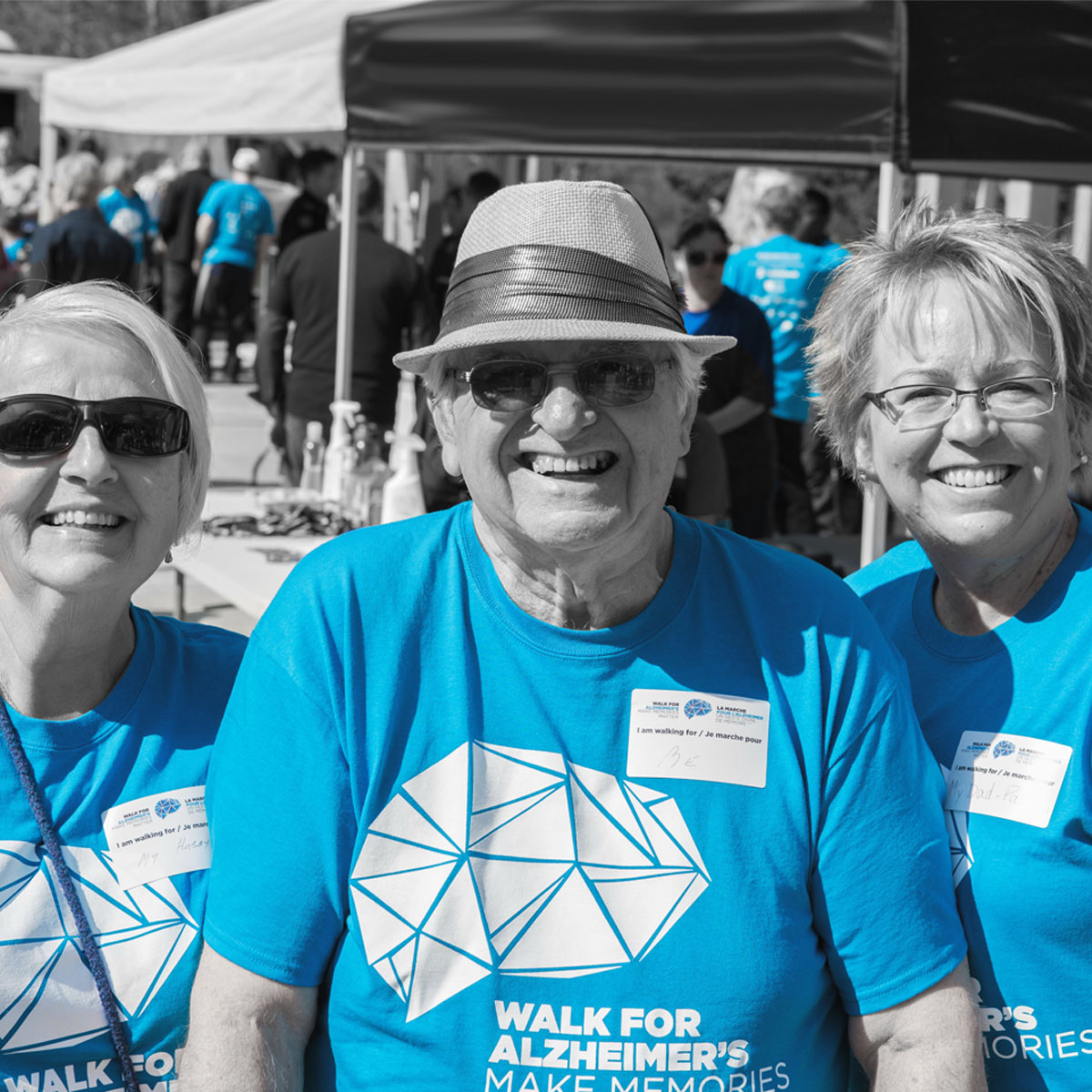 Happy group of three seniors participating in their local Investors Group Walk for Alzheimers