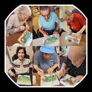 Residents engaging in Painting to Music.