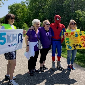 Our 2023 team members, Hedi & Karen, with Spider Man & Alzheimer's Society Staff