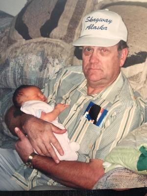 My grandfather holding baby me ��